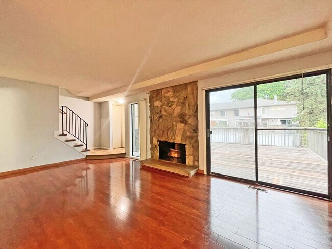 Building Photo - Spacious End-Unit Townhome with Fireplace, Family Room, 2-car Garage, Community Pool & Playground...