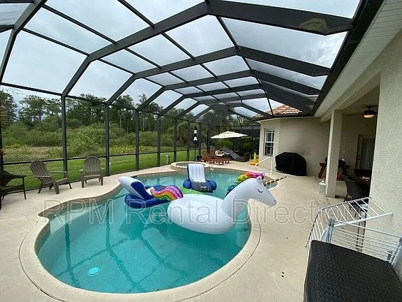 Building Photo - 4-Bedroom W/Den Lakefront Pool Home with Spa in Gated Promenade East at The Forum