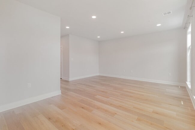 Building Photo - Modern 2025 Townhome | Open-Concept Living, Chef’s Kitchen with Large Island & 2-Car Garage