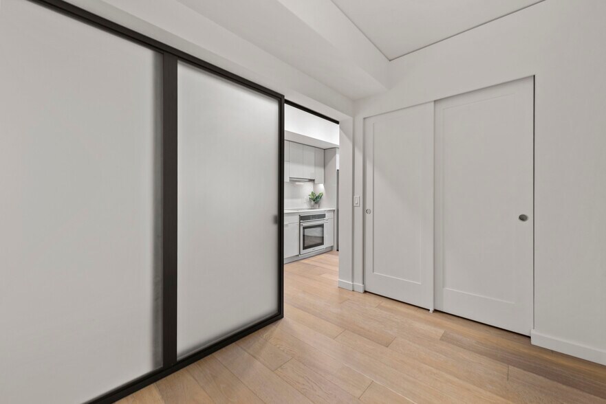 bedroom sliding door to kitchen - 450 S Main St