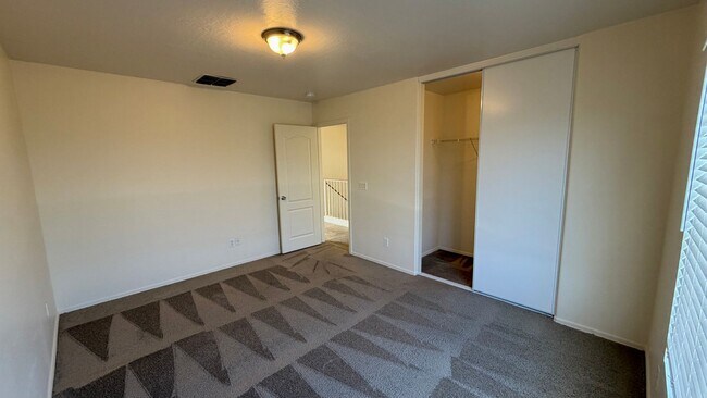 Building Photo - Two Story Home with NEW tile and a large backyard!