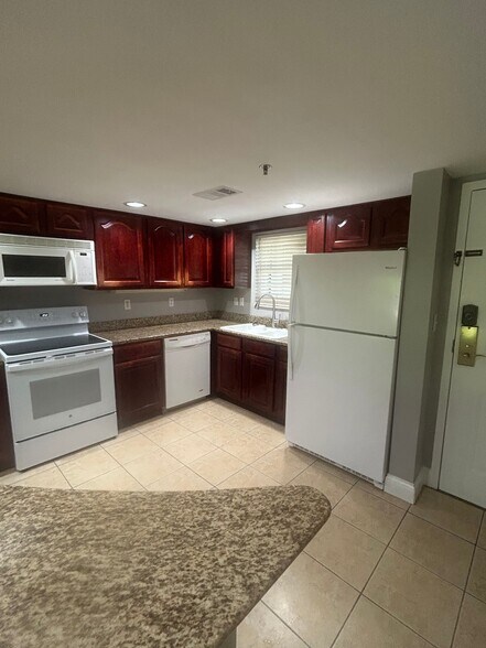 Kitchen with front door - 210 Roaring Fork Ext