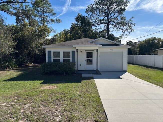 Building Photo - Cute Home Ready for Family