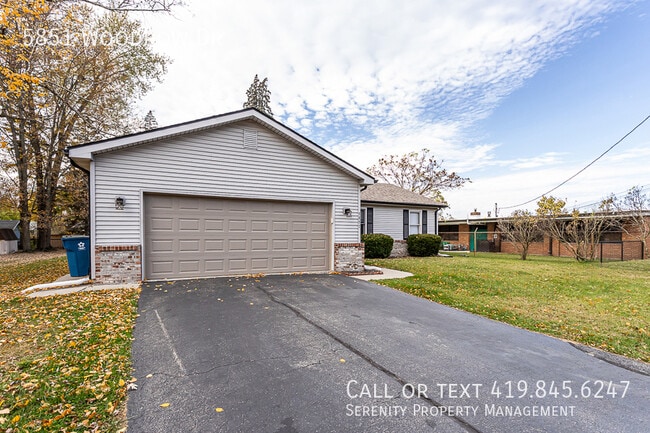 Building Photo - 5851 Woodrow Dr