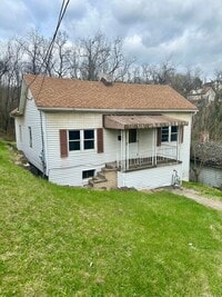 Building Photo - Three Bedroom Single Family House