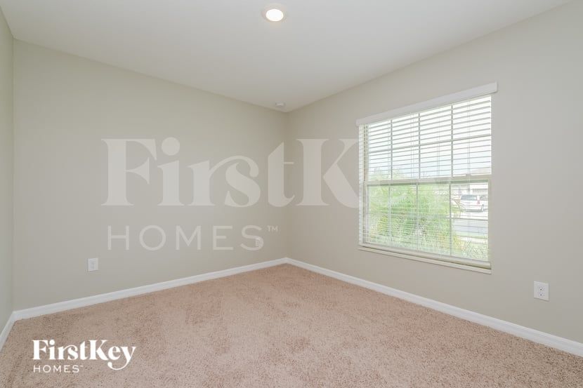 Building Photo - 6117 Tremeza Pl