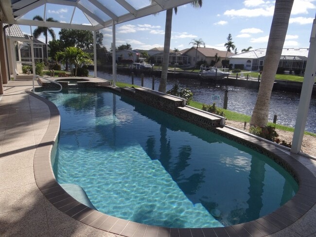 Building Photo - AVAILABLE 2027 SEASON!  TOP OF THE LINE PUNTA GORDA ISLES POOL, SALTWATERFRONT HOME FOR RENT! $74...