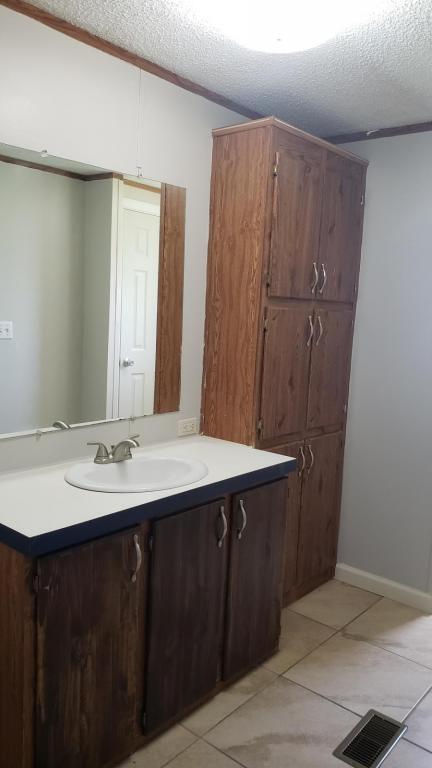 Building Photo - 6255 Post Oak Ln., #28