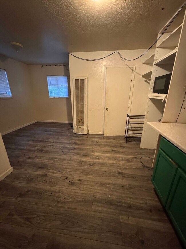 Building Photo - LONG-TERM RENTAL: Updated Studio with Shar...