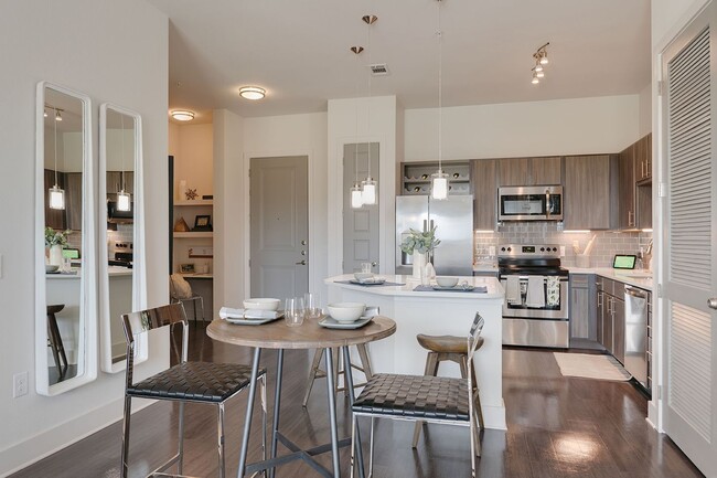 Custom Cabinetry with Designer Hardware and Subway Tile Backsplashes - Cortland Allen Station