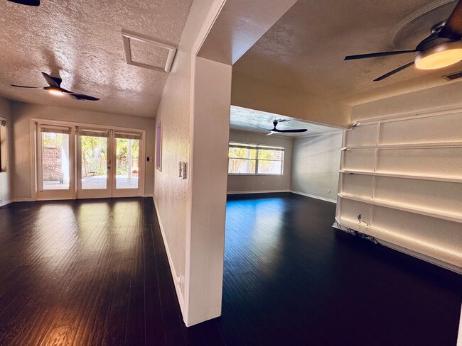 Building Photo - Elegant and Updated 3/2 Pool Home just min...