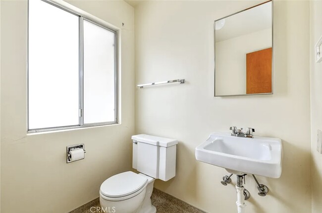 1/2 Bath near laundry - 679 Rancho Dr