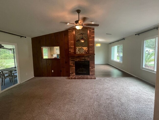 Building Photo - 3/2 (Northwood Oaks) Beautiful split floor plan home with custom brick accents and large landscap...