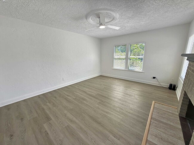 Building Photo - Recently Updated 3/2 with Pool and 2 Car Garage