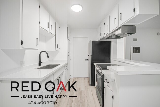 Building Photo - 211 S Ave 57