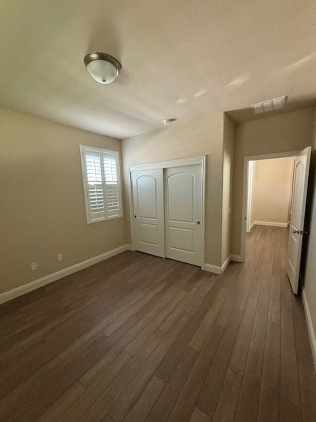 Building Photo - Move-In Ready: Elegant 4-Bedroom Home with Paid Solar in Gated Community