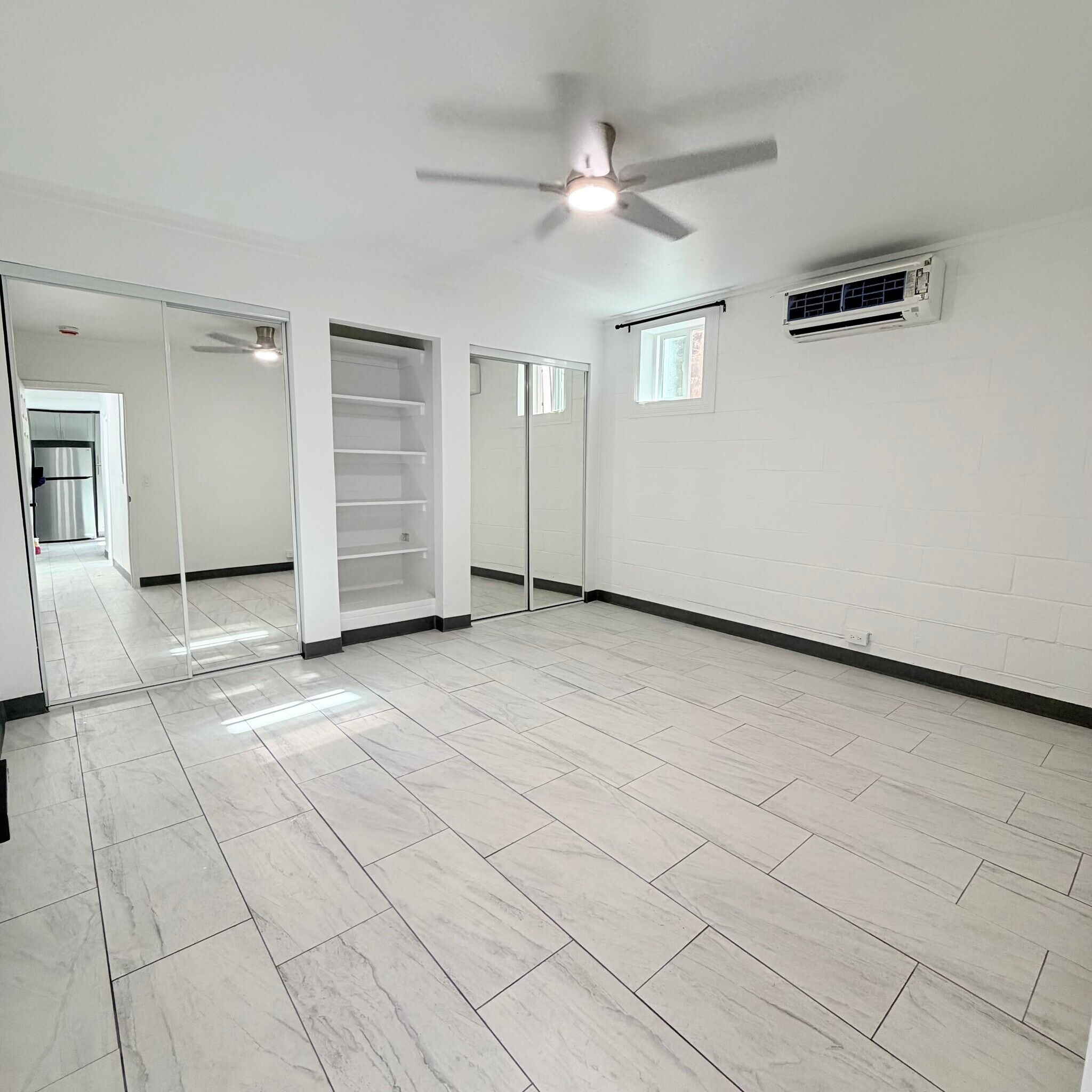 Large primary bedroom with two closets and split AC - 1739 Kamohoalii St