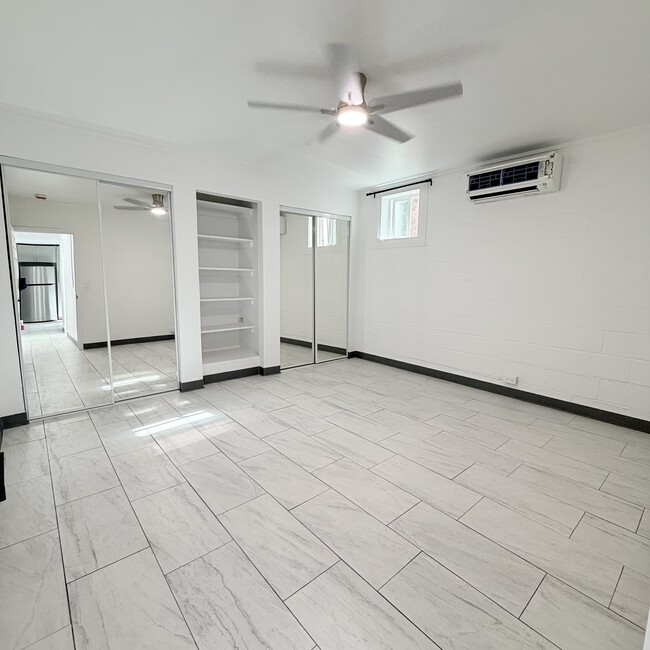 Large primary bedroom with two closets and split AC - 1739 Kamohoalii St