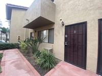Building Photo - Updated condominium in a quiet gated commu...