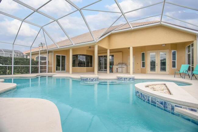 Building Photo - 4/3 pool home on golf course, furnished, $...