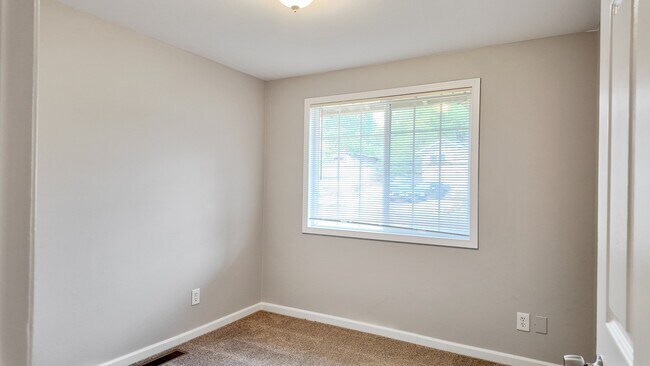 Building Photo - Charming 3BR Home with Massive Fenced in Yard