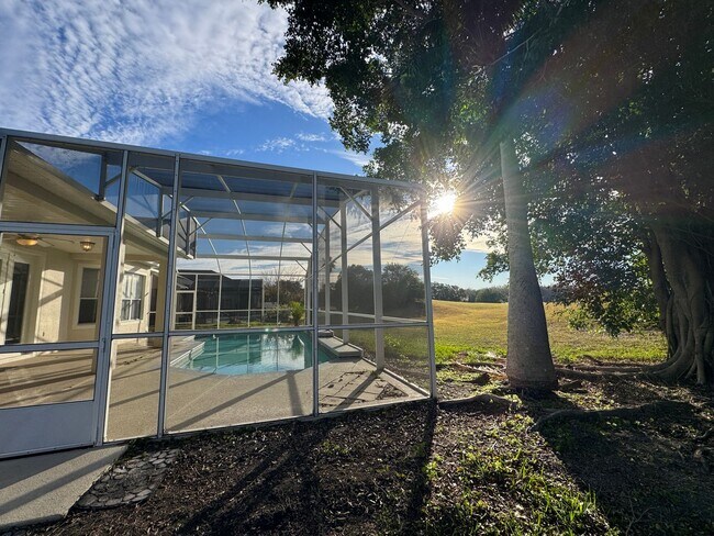 Building Photo - Spacious 4-Bedroom Home with Private Pool and Modern Comforts