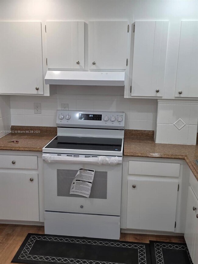 Building Photo - 7440 Harding Ave