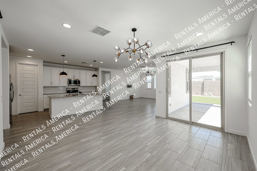 Building Photo - 12380 W Wagon Wheel Dr