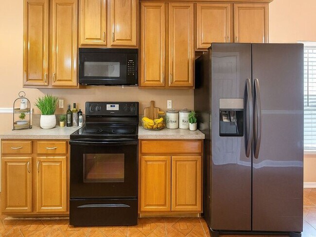 Building Photo - Spacious 4BR w/ Fenced Yard + Covered Lanai + 2 Car Garage  in Orange Park!