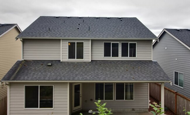 Backside of home - 596 NE Nantucket St