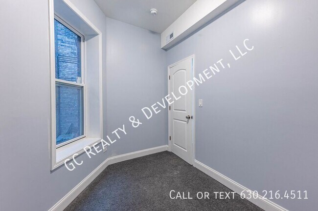 Building Photo - 6433 S Vernon Ave