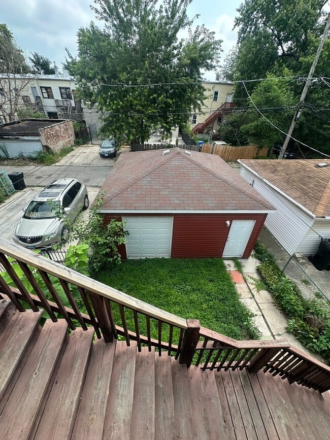 Building Photo - 6613 S Vernon Ave