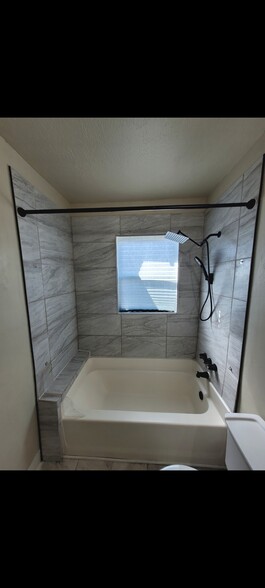 New shower - 1711 Carr St