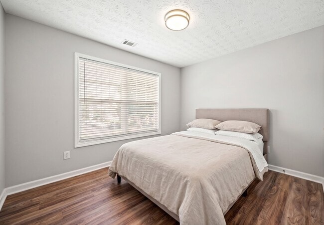 Building Photo - 3-bedroom, 2.5-bath end-unit townhome in the Garrison Square