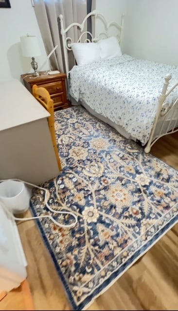 new rug in second bedroom 11/4/25 - 360 Columbia St NE