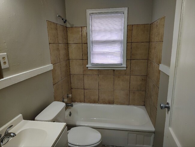 Building Photo - A rare find - 2 bathrooms! Move-in special...