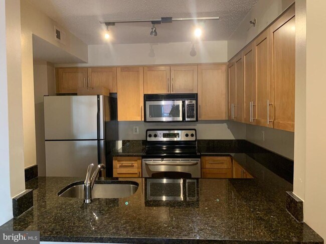 Building Photo - 7500 Woodmont Ave