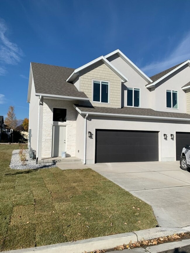 Building Photo - Spacious 4-Bedroom End-Unit Townhome with 2-Car Garage | Pet-Friendly | American Fork