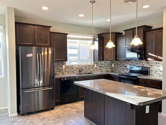 Building Photo - 11741 W Chase Ln