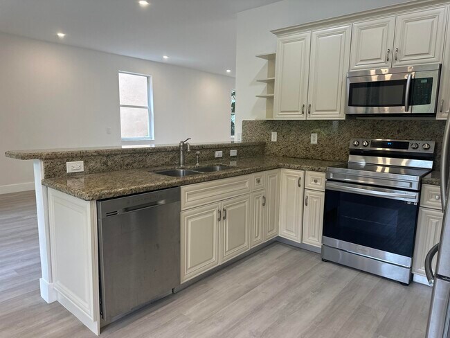 Building Photo - 10702 NW 1st Ct