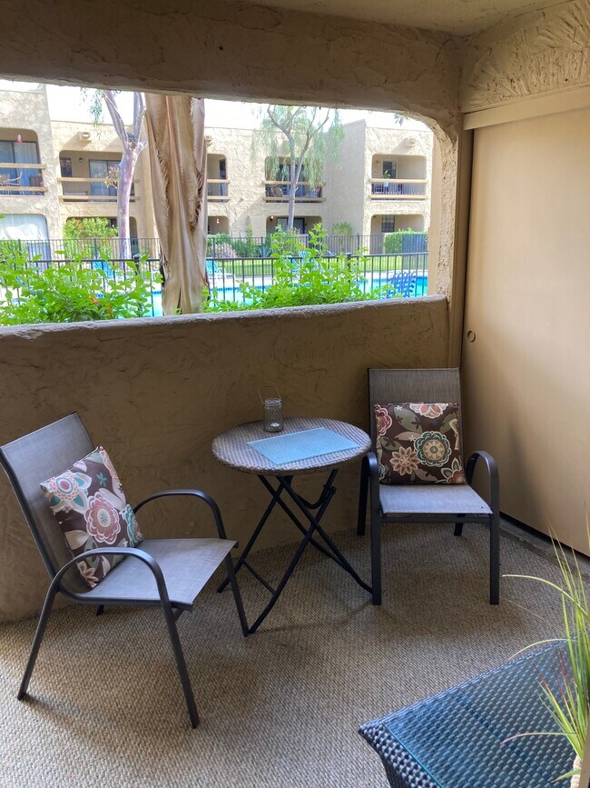 Patio area, pool right outside - 5300 E Waverly Dr