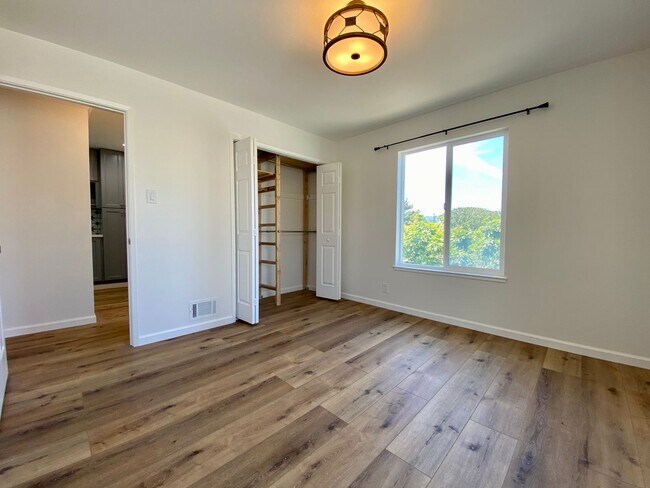 Building Photo - Remodeled 3BR, 2BA with Orchard, Garage & ...