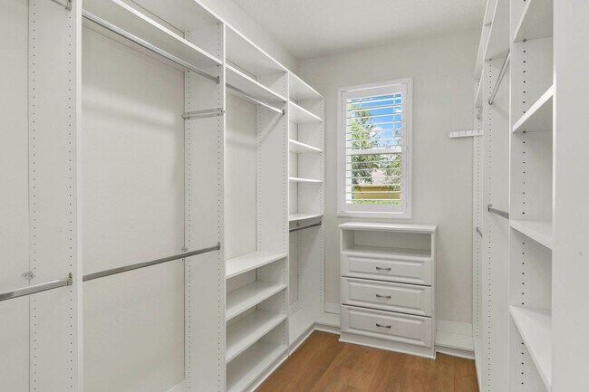 Building Photo - Expansive 4 bedroom, 3 bath remodeled home in gated community