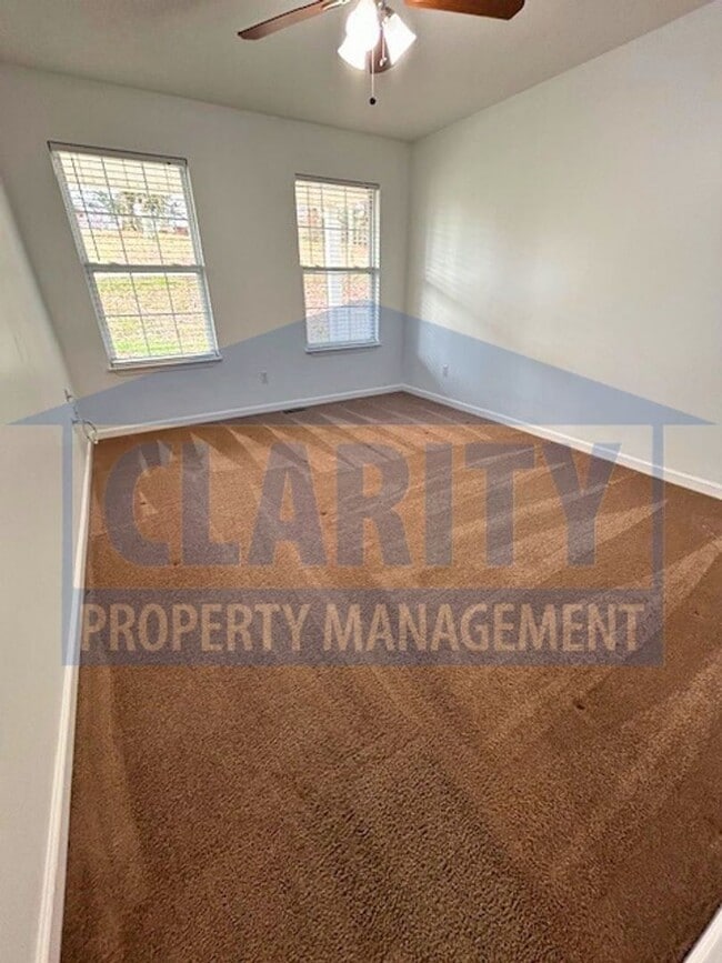 Building Photo - Three bedroom with attached garage!