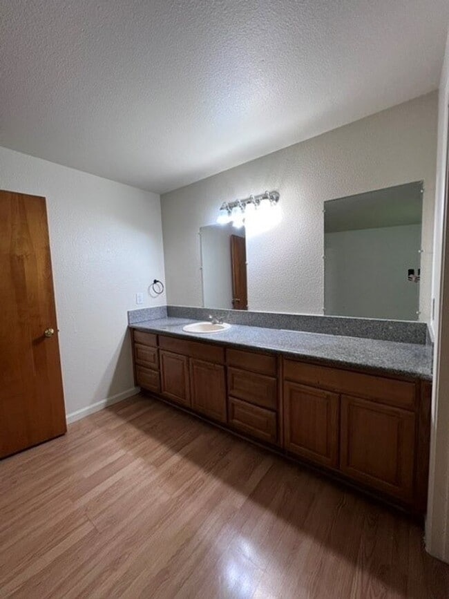 Building Photo - Freshly painted 4 bedroom home on over 2 acres of land.