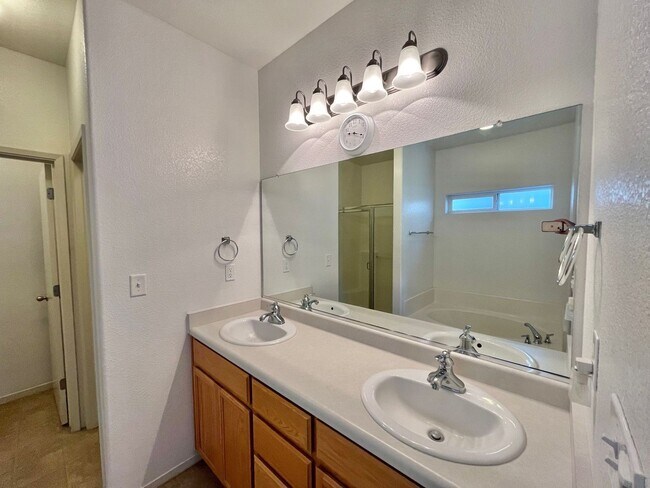 Building Photo - Large Corner Lot Home with Landscaping included!