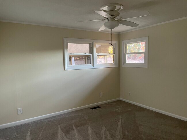 Main bedroom that looks over screen porch and yard - 48 Hope Rd
