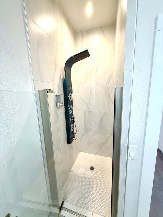 Building Photo - AVAILABLE NOW! Jaw Dropping 3 Story 3 Bedr...