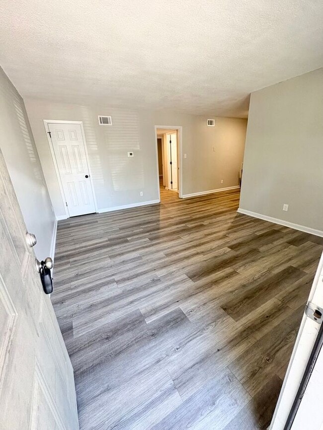 Building Photo - Steps from UofM & Highland Strip – First-Floor 2BR Apartment at The Den!