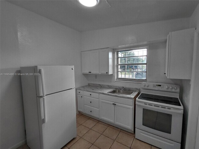 Building Photo - 7051 NW 21st Ave
